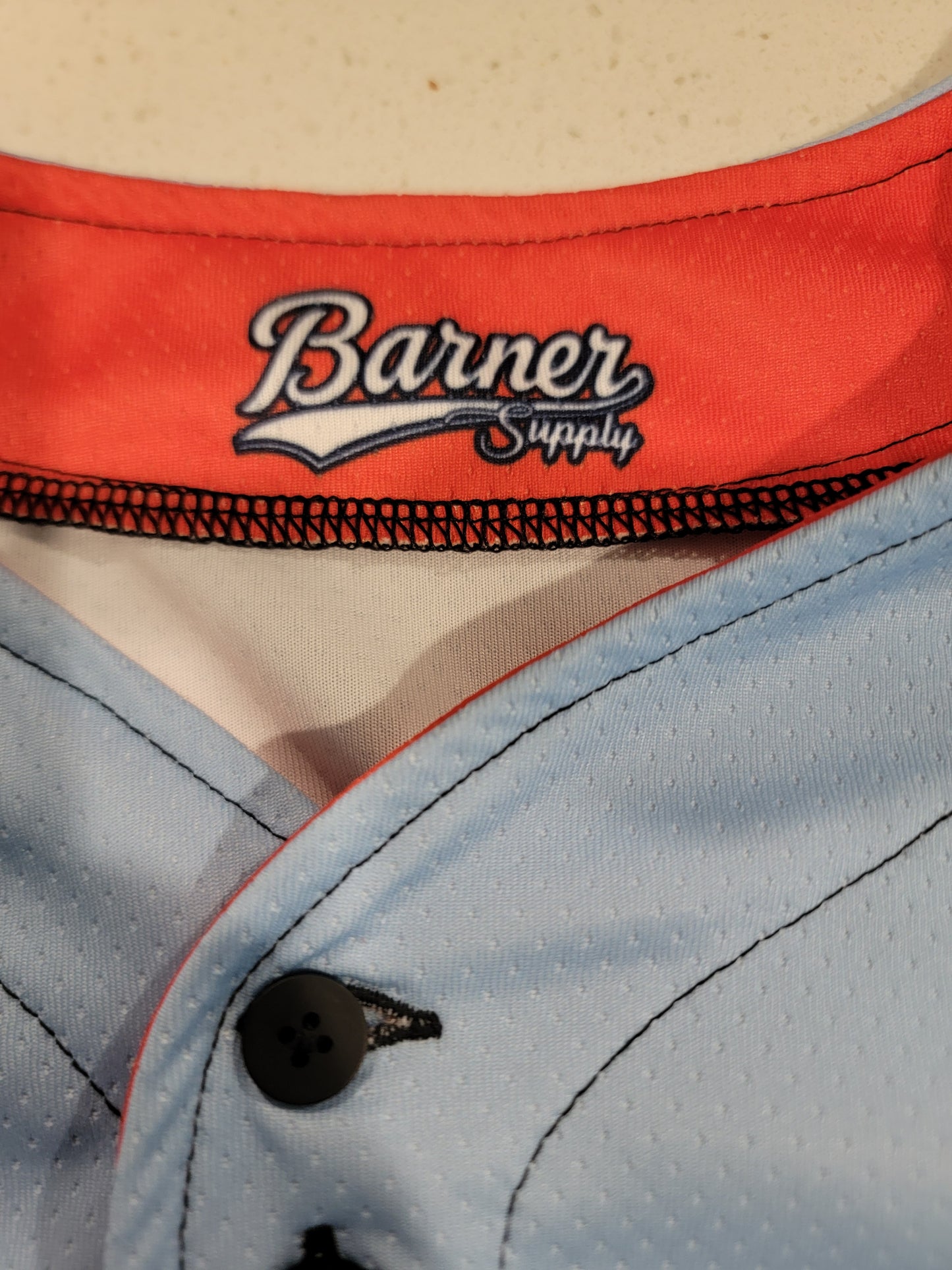 Double Aught Barner and a White Tumbler